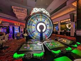 Various devices showing okplay slot website on Android phone, iPhone, and laptop browser